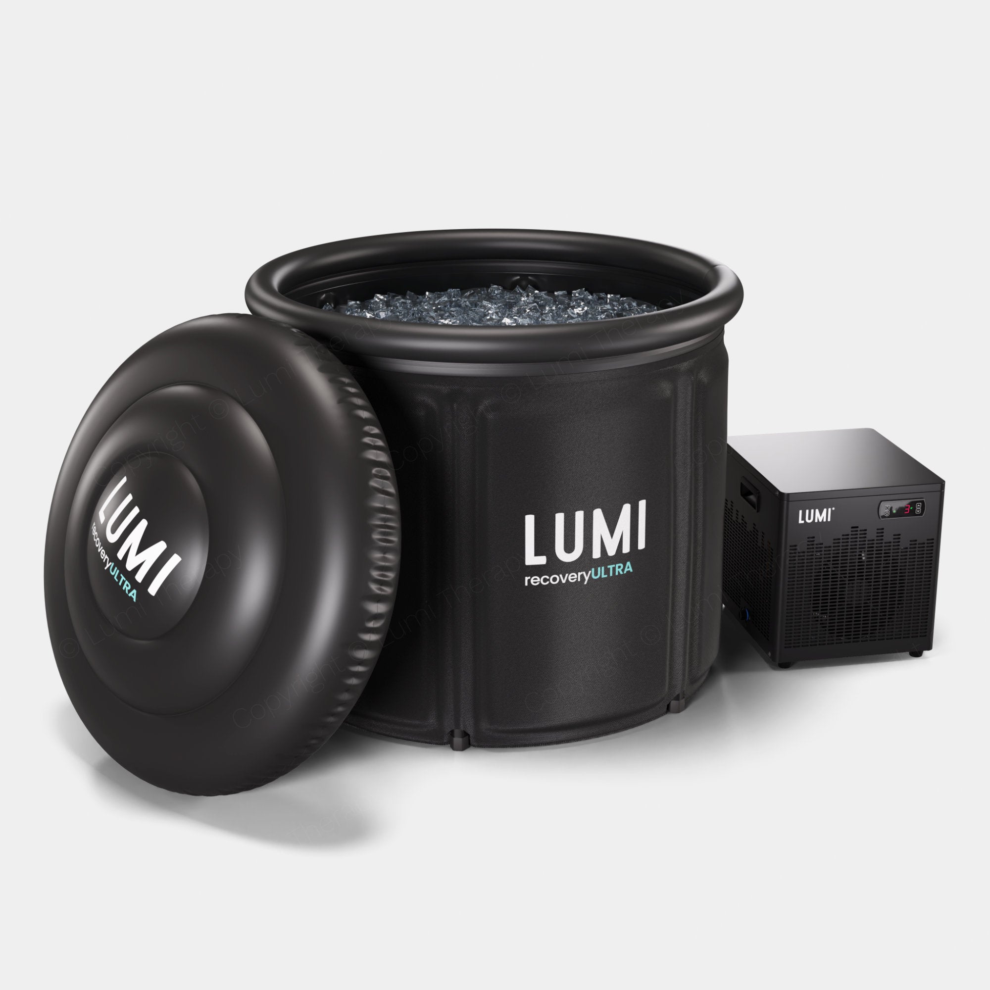 LUMI Recovery Ultra and Cube Chiller set featuring a large black portable ice bath filled with ice water, alongside a compact black cooling unit. Professional-grade cold therapy system with removable lid and integrated cooling technology.