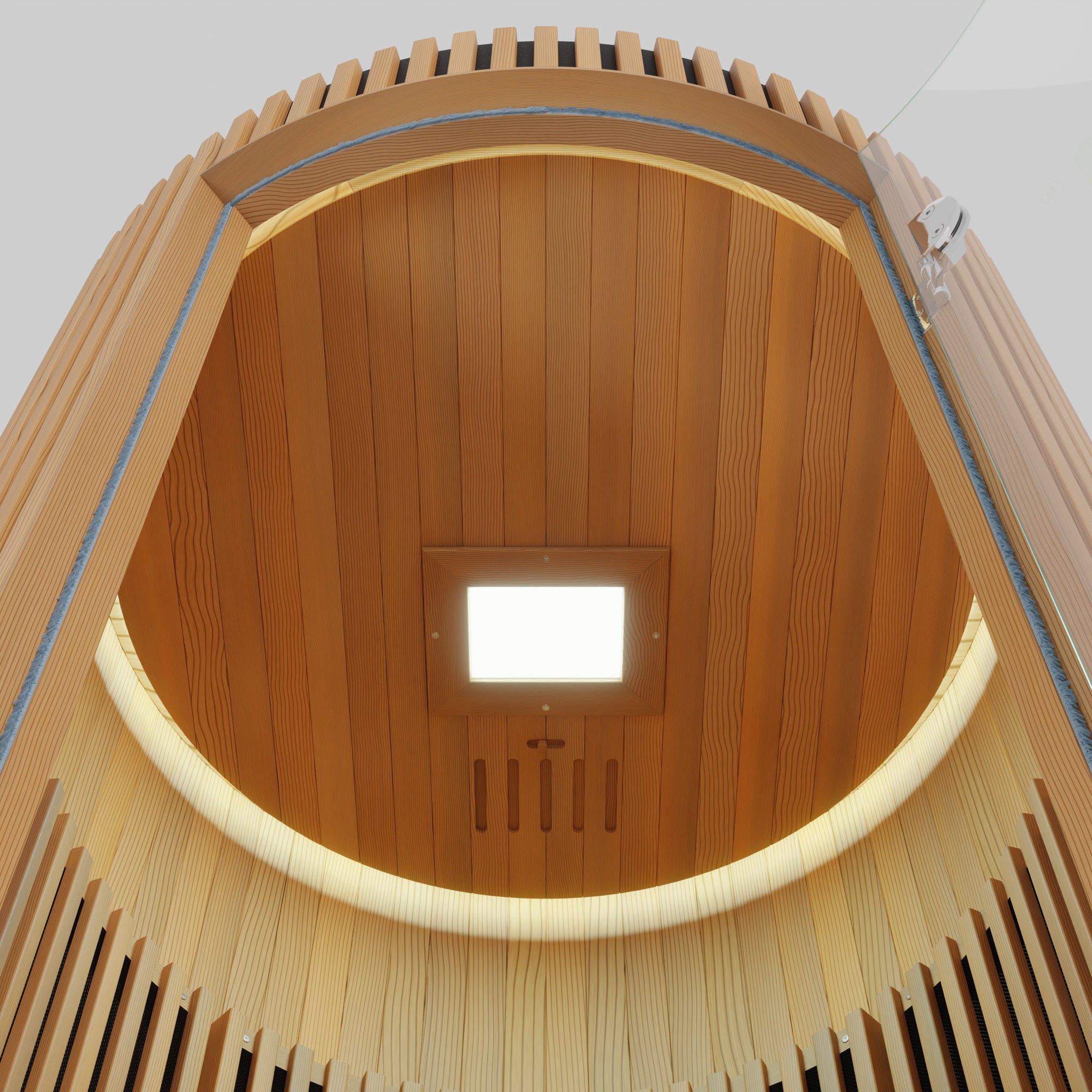 LUMI Infrared Sauna PRO interior ceiling view showing elegant curved Hemlock wood paneling, built-in LED light panel, and premium barrel-style construction with modern Nordic design elements emphasizing warmth and craftsmanship