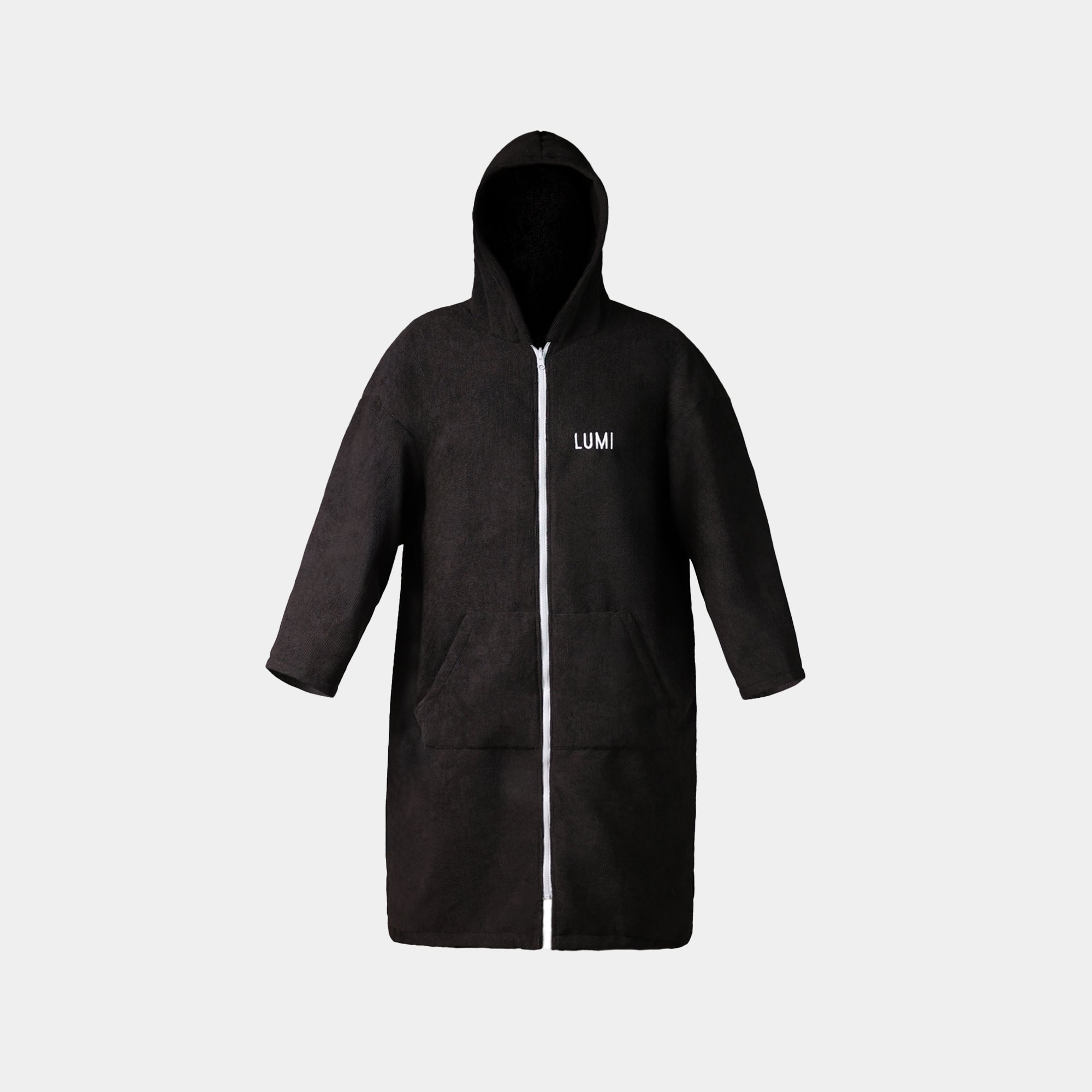 PRO DUO Changing Robe in black with white zipper detail, featuring a hooded design, long sleeves, and LUMI branding. Full-length waterproof robe shown against white background, displaying modern Nordic-inspired styling and practical front pockets.