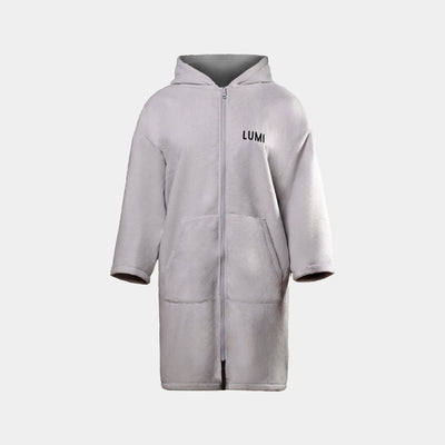 LUMI PRO DUO Changing Robe in grey, featuring a full-length hooded design with front zip closure, large front pockets, and LUMI logo. Waterproof outer shell with fleece lining, perfect for outdoor activities and post-swim changing comfort.
