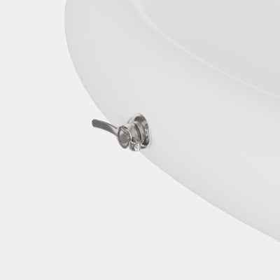 Thermo Lid featuring a close-up view of the metallic drainage valve mechanism mounted on a smooth white insulated surface, demonstrating the premium build quality and functionality of the ice bath cover