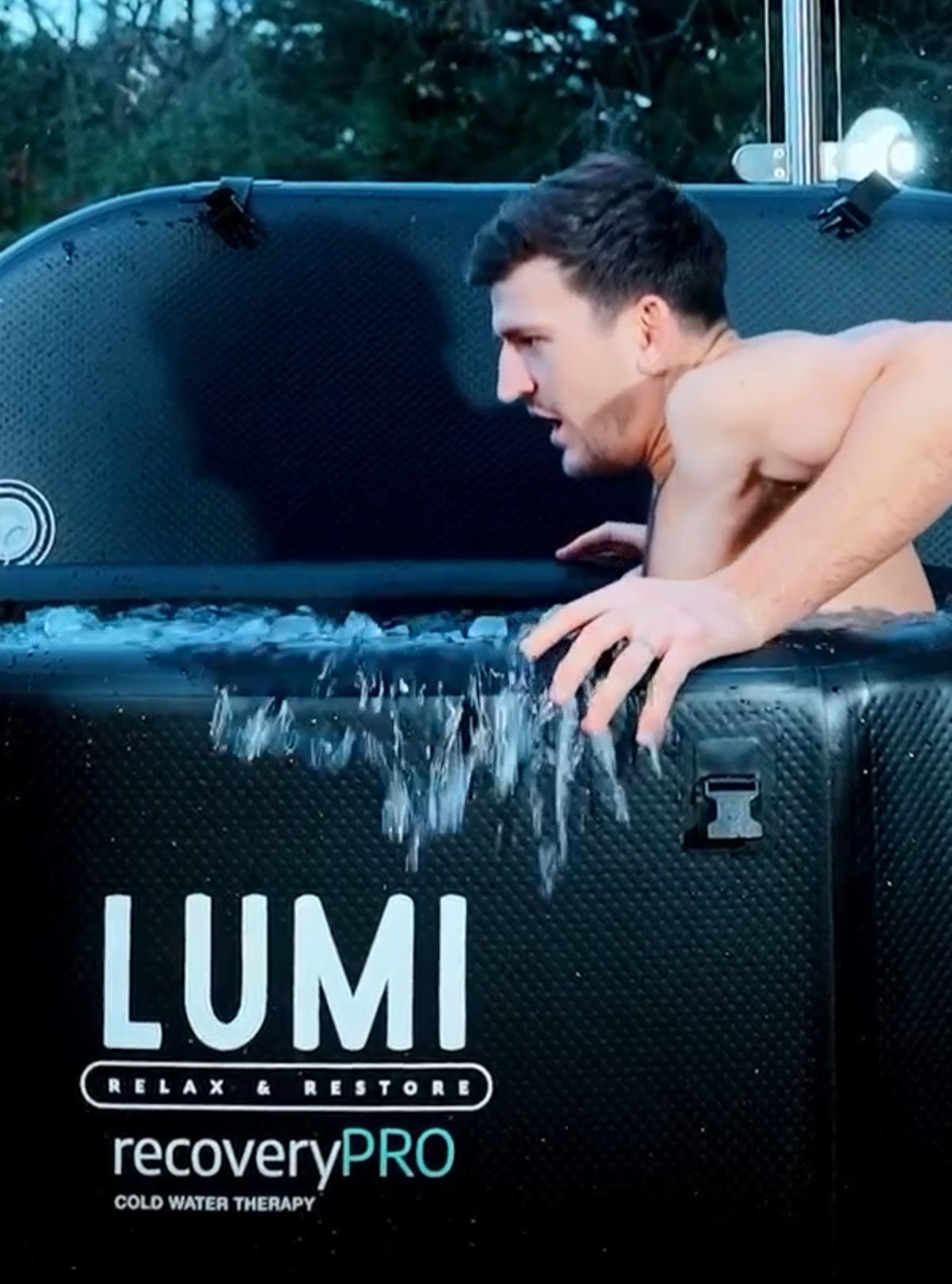 Harry Maguire getting into a LUMI Recovery Pod Pro Bath 