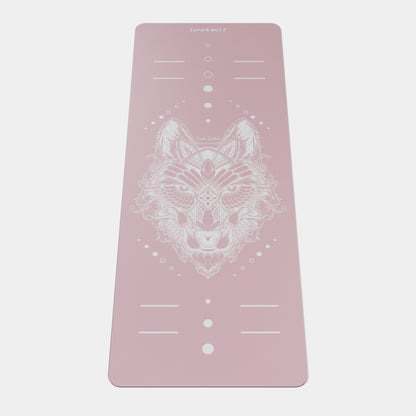 Eco Wolf Yoga Mat - Nude Edition featuring a geometric white wolf head design centered on a dusty pink non-slip surface with alignment markers and positioning dots, perfect for yoga practice and meditation