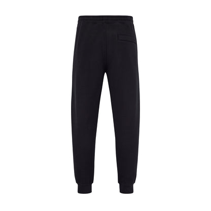 Men's LCC Sweatpants Black featuring heavyweight cotton-polyester blend fabric with elastic waistband and cuffed ankles, displayed in relaxed fit against white background, showing raised rubber LUMI logo and back pocket detail.