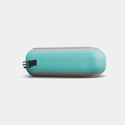 PRO Barrel Step - Inflatable turquoise and grey step with non-slip surface and secure strap, designed for safe ice barrel entry. Side view showing durable PVC construction and compact portable design.