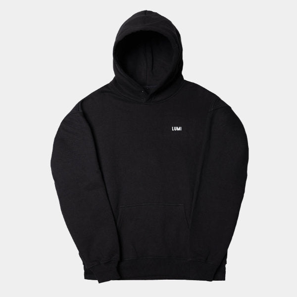 Black Unisex LCC Oversized Hoodie featuring a minimalist design with front chest LUMI logo, adjustable hood, ribbed cuffs, and kangaroo pocket, shown in a straight-on product photography style against a white background.