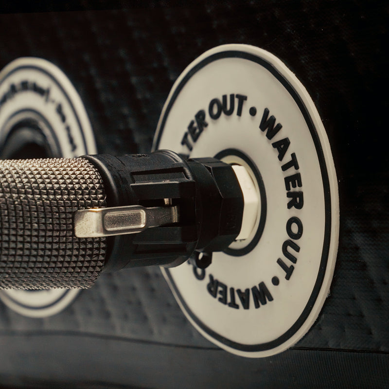 Closeup detail photo of the cam-lock pipe attachment connected to the adaptor on the side of the LUMI Pro Duo ice bath.