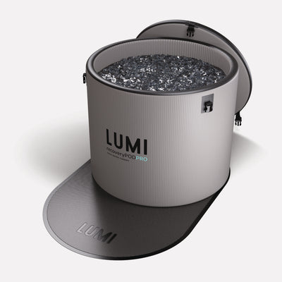 LUMI Ice Bath Floor Mat with non-slip rubberized surface and breathable mesh structure shown with LUMI Recovery Pod PRO